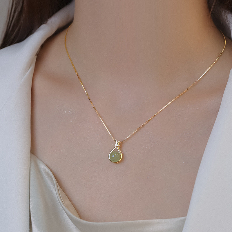 Necklace 18K gold exquisite and simple hollow lucky bag with gemstone design versatile