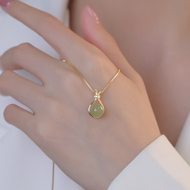 Necklace 18K gold exquisite and simple hollow lucky bag with gemstone design versatile